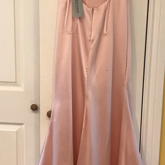 I have a beautiful size 8 brand new light pink satin prom dress. It is stunning! - Picture 3 of 8